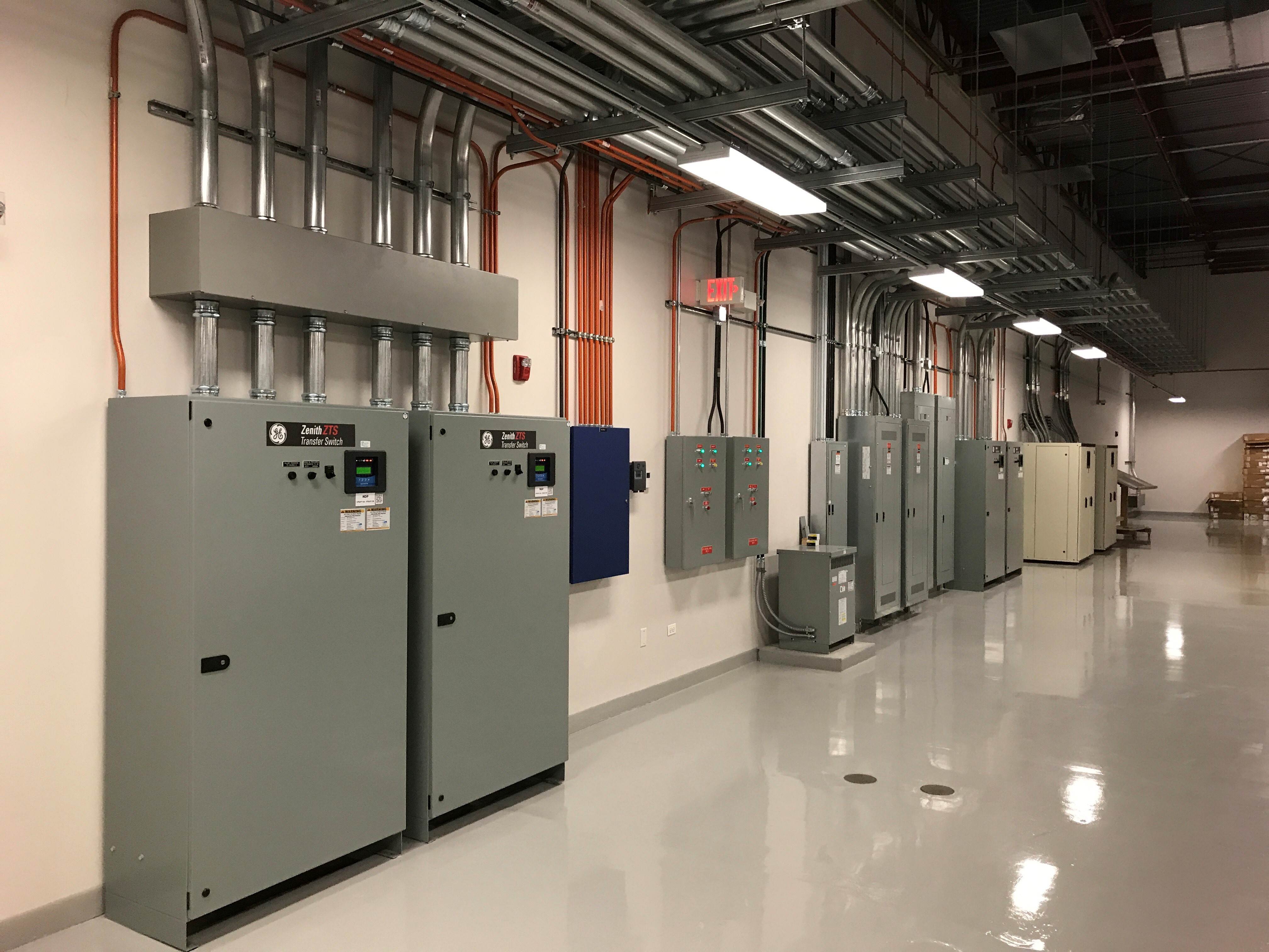 Redundant automatic transfer switches and distribution panels in the facility's power room